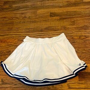 White varsity skirt with navy border